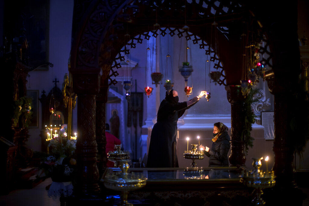APTOPIX Virus Outbreak Lithuania Orthodox Christmas